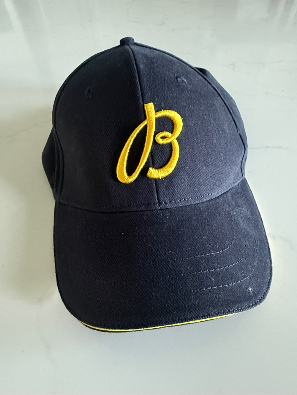 Breitling Dark Blue Cap with Yellow 'B' Emblem
